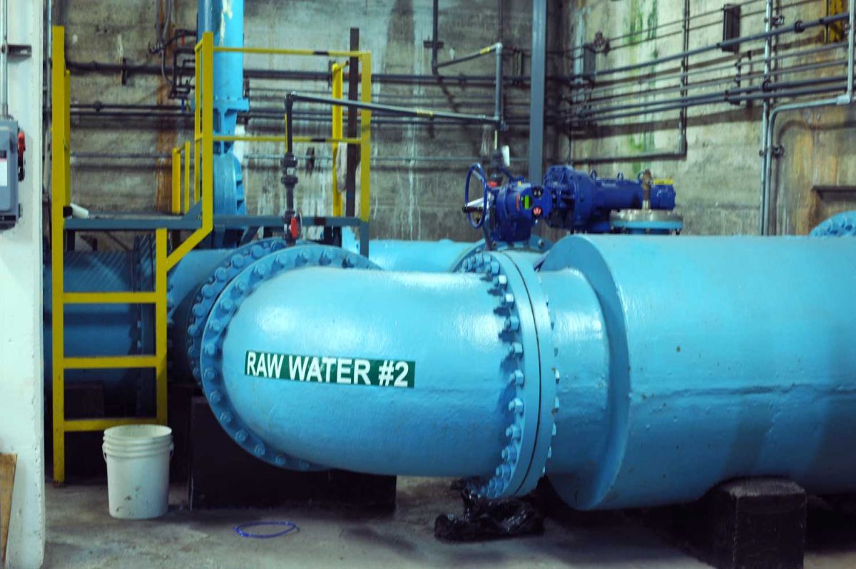Large blue raw water pipeline labeled 